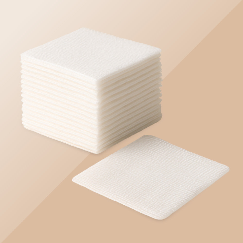 White cotton pads and tattoo gauze for tattoo, PMU and beauty